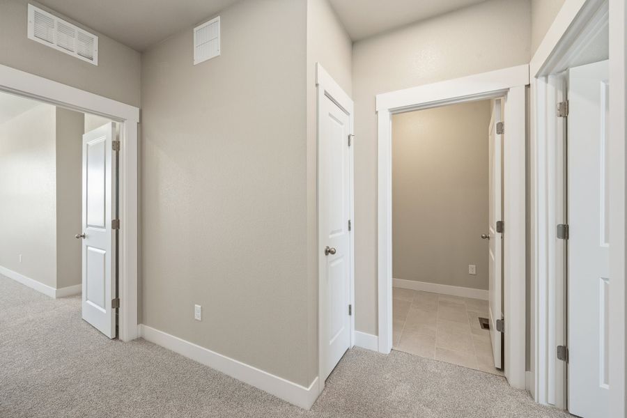 Spacious, unfurnished interior of a new home in The Lakes at Centerra, Loveland (Image 17).