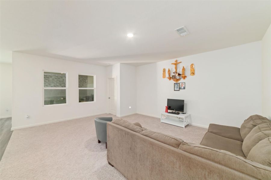 Furnished interior view inside a new home in Sunterra, Katy (Image 5).