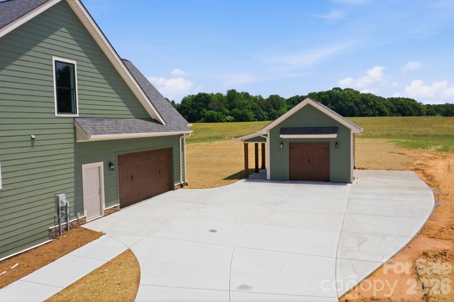 Front exterior of a new home in , Statesville, NC, highlighting curb appeal (Image 2). Front exterior of a new home in , Statesville, NC, highlighting curb appeal (Image 2).