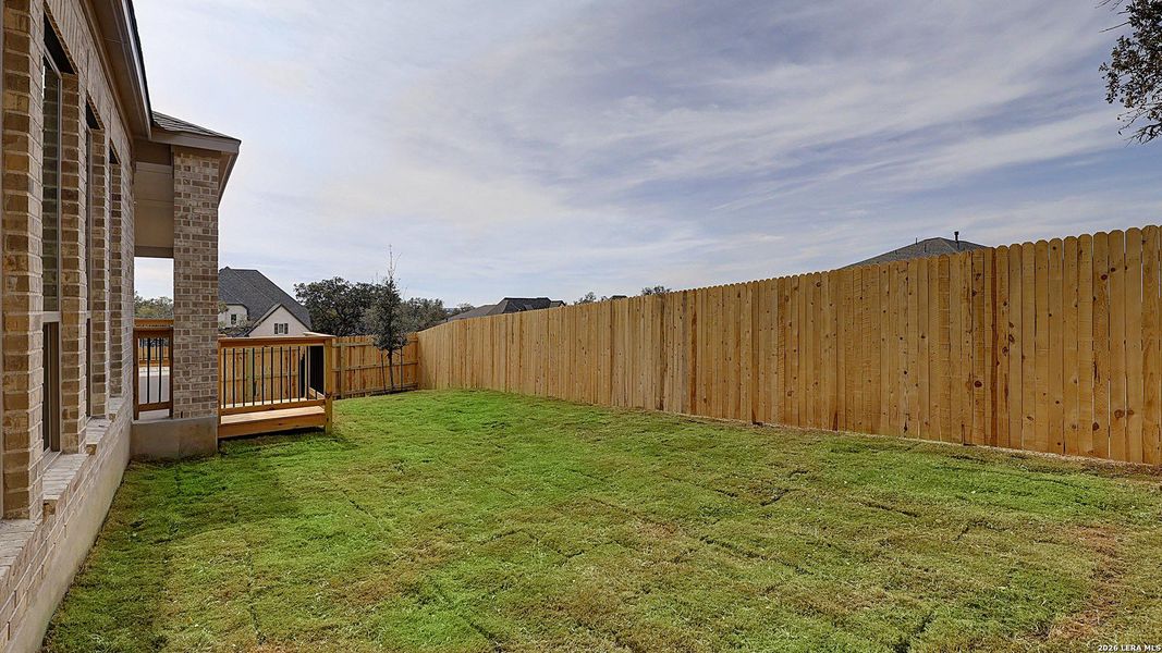 Exterior details and patio area of a home in The Ranches at Creekside, Boerne (Image 20).
