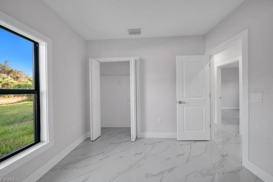 Spacious, unfurnished interior of a new home in , Lehigh Acres (Image 19).
