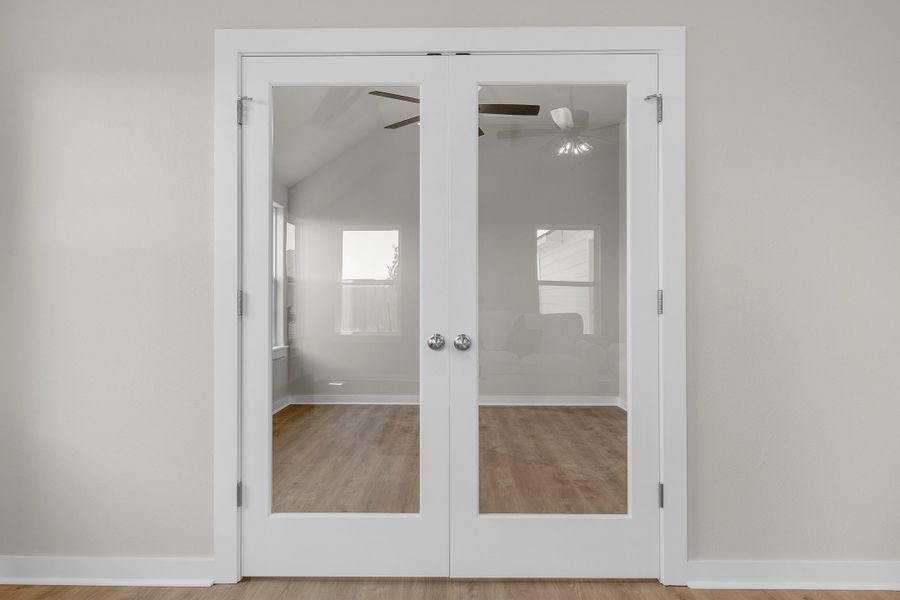 Representative furnished interior of a home built from the The Poppy by Avonley Homes in Rudder Pointe, Bryan (Image 32).