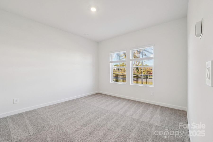 Spacious, unfurnished interior of a new home in Meadows at Wilson Farms - The Heights Series, Fort Mill (Image 22). Spacious, unfurnished interior of a new home in Meadows at Wilson Farms - The Heights Series, Fort Mill (Image 22).