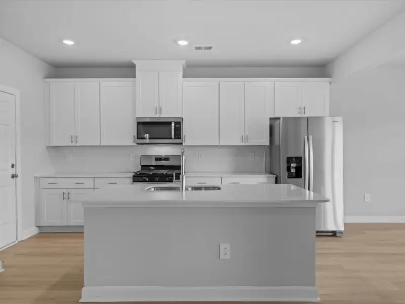 Furnished interior view inside a new home in The Farm at Wells Creek - Heritage Collection, Gray Court (Image 5). Furnished interior view inside a new home in The Farm at Wells Creek - Heritage Collection, Gray Court (Image 5).