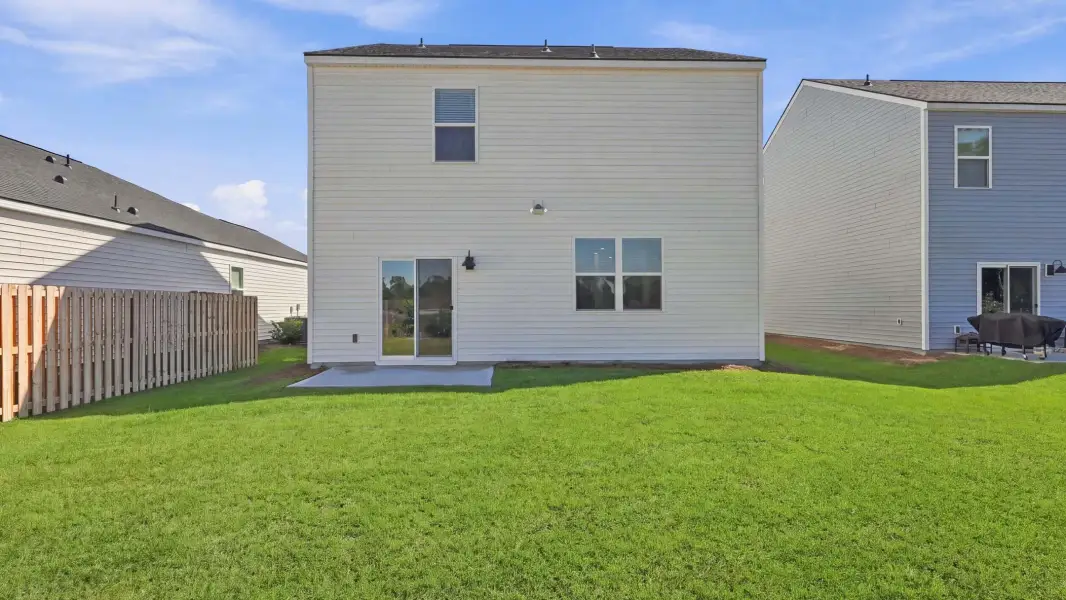Exterior details and patio area of a home in The Lakes at North Glynn, Brunswick (Image 2).