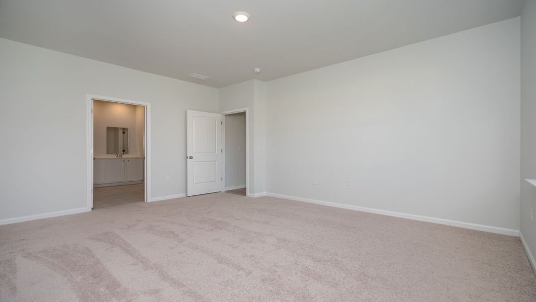 Spacious, unfurnished interior of a new home in Cedar Hill Landing, Navassa (Image 21).