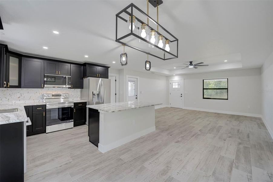 Furnished interior view inside a new home in , Port Charlotte (Image 5).