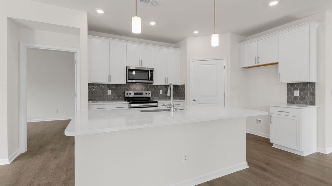 Furnished interior view inside a new home in The Villas at Kinsley, Jamestown (Image 4).