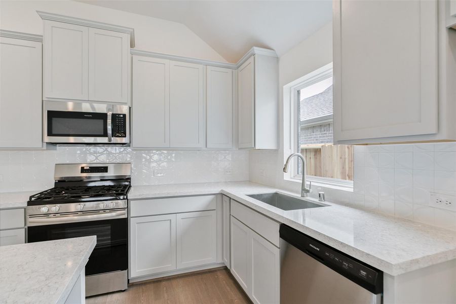 Furnished interior view inside a new home in Westland Ranch, League City (Image 10).