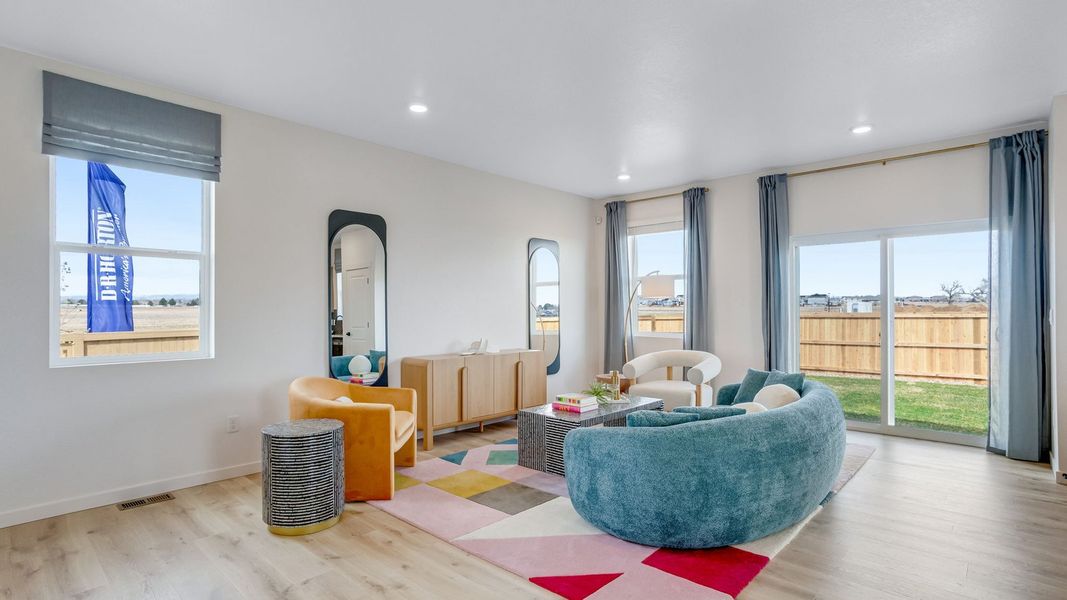 Representative furnished interior of a home built from the Elder by D.R. Horton in Sky Ranch, Watkins (Image 6).