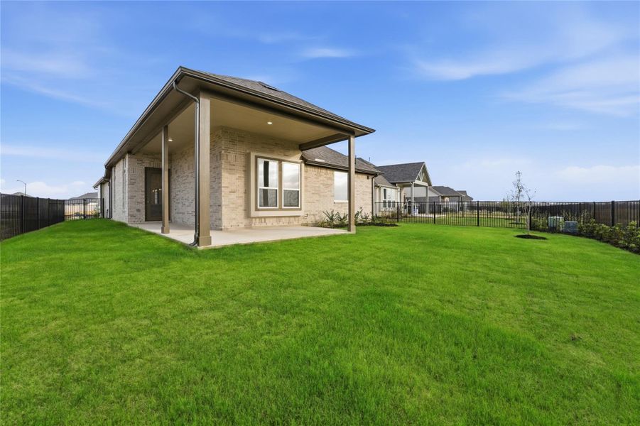 Exterior details and patio area of a home in Bridgeland, Cypress (Image 3).