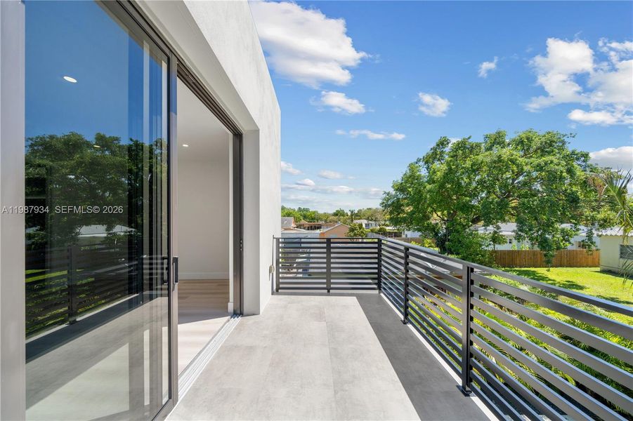 Exterior details and patio area of a home in , Miami (Image 3).