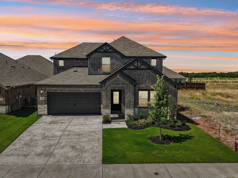 Front exterior of a new home in Lakehaven - Signature Series, Farmersville, TX, highlighting curb appeal (Image 2). Front exterior of a new home in Lakehaven - Signature Series, Farmersville, TX, highlighting curb appeal (Image 2).