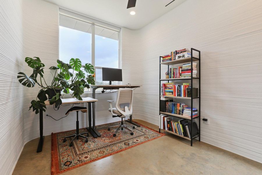 Office space featuring concrete floors, recessed lighting, and ceiling fan
