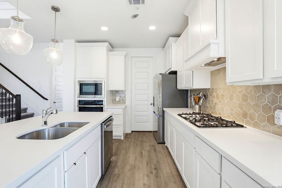 Furnished interior view inside a new home in Kallison Ranch, San Antonio (Image 15).