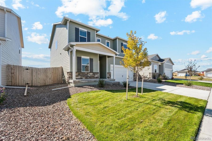 Exterior details and patio area of a home in Cottonwood Greens, Fort Lupton (Image 2). Exterior details and patio area of a home in Cottonwood Greens, Fort Lupton (Image 2).