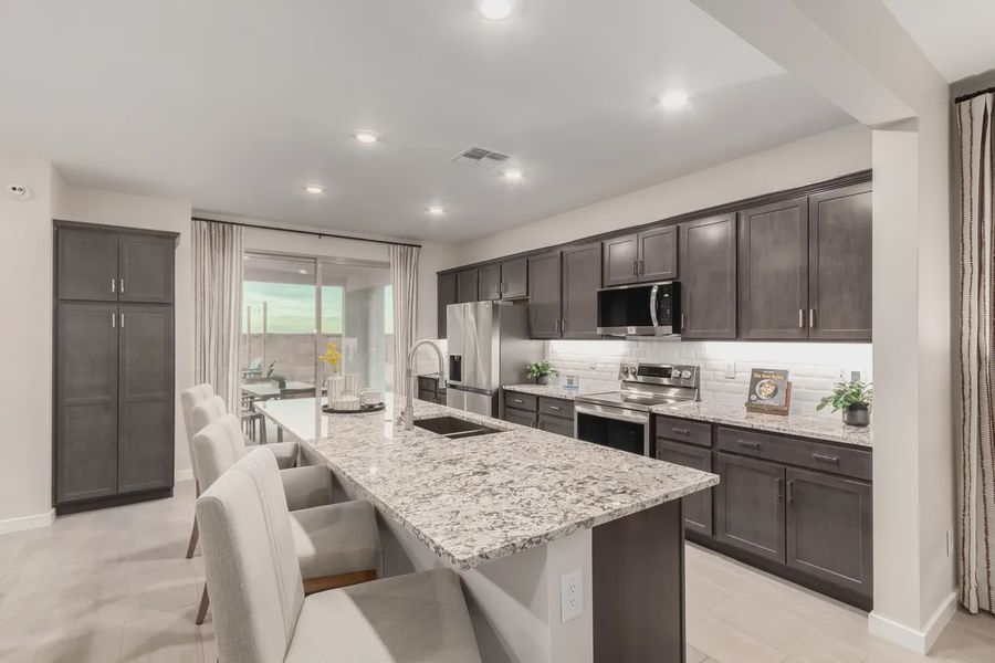 Furnished interior view inside a new home in Avanti at Granite Vista, Waddell (Image 7).