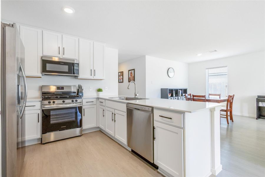 Furnished interior view inside a new home in Tavola, New Caney (Image 11).