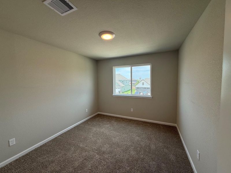Spacious, unfurnished interior of a new home in Midtown Reserve, College Station (Image 8).