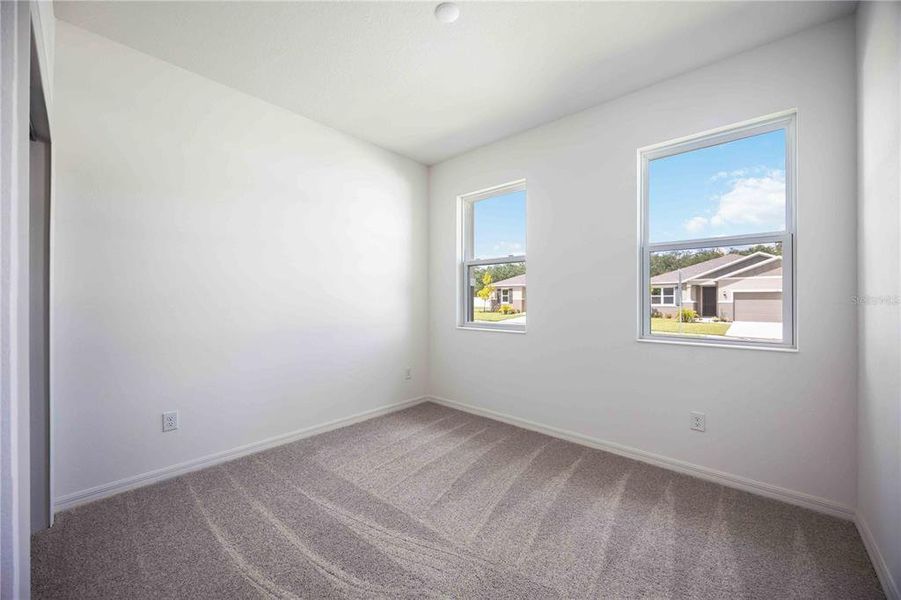 Spacious, unfurnished interior of a new home in Creekside at Rutland Ranch, Parrish (Image 16).