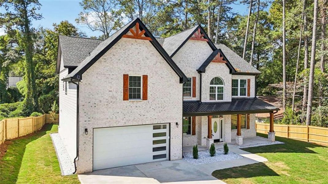 Front exterior of a new home in , Lilburn, GA, highlighting curb appeal (Image 24). Front exterior of a new home in , Lilburn, GA, highlighting curb appeal (Image 24).