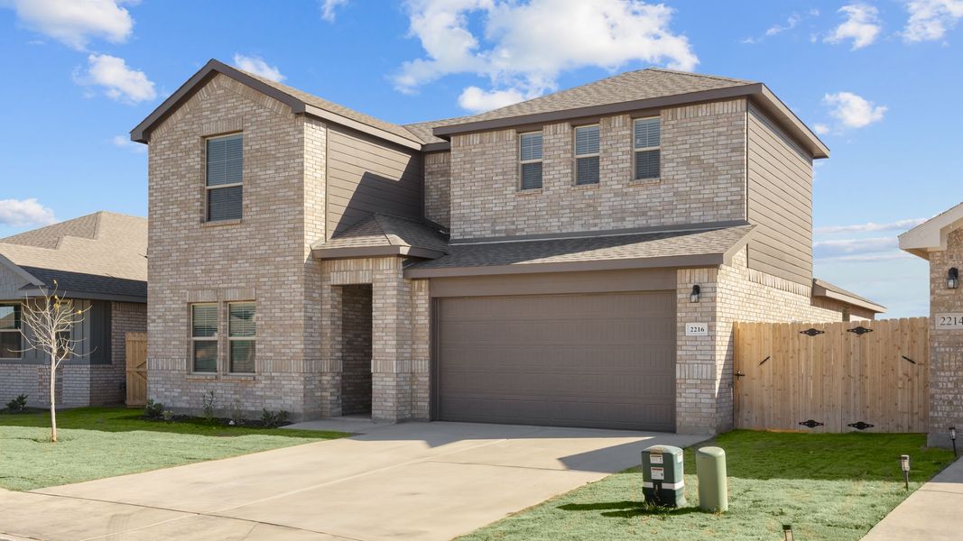 Representative exterior photo of a completed home built from the GLENWOOD by D.R. Horton in Northwest Passage, Midland, TX (Image 15). Representative exterior photo of a completed home built from the GLENWOOD by D.R. Horton in Northwest Passage, Midland, TX (Image 15).