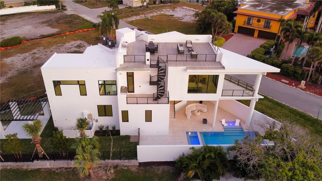 Exterior details and patio area of a home in , Longboat Key (Image 44).