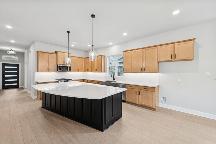 Furnished interior view inside a new home in Meridiana 55' Homesites, Manvel (Image 5).