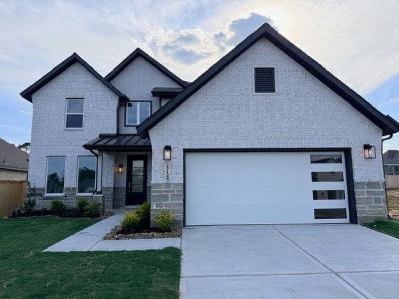 Front exterior of a new home in Kresston, Montgomery, TX, highlighting curb appeal (Image 1). Front exterior of a new home in Kresston, Montgomery, TX, highlighting curb appeal (Image 1).