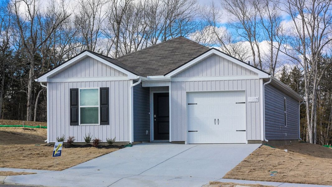 Front exterior of a new home in Saddle Trace, Lewisburg, TN, highlighting curb appeal (Image 2). Front exterior of a new home in Saddle Trace, Lewisburg, TN, highlighting curb appeal (Image 2).