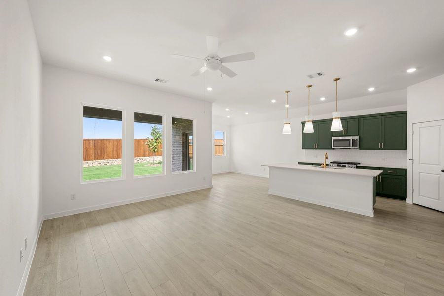 Open Kitchen-Living-Dining Room featuring the Luxe Collection
