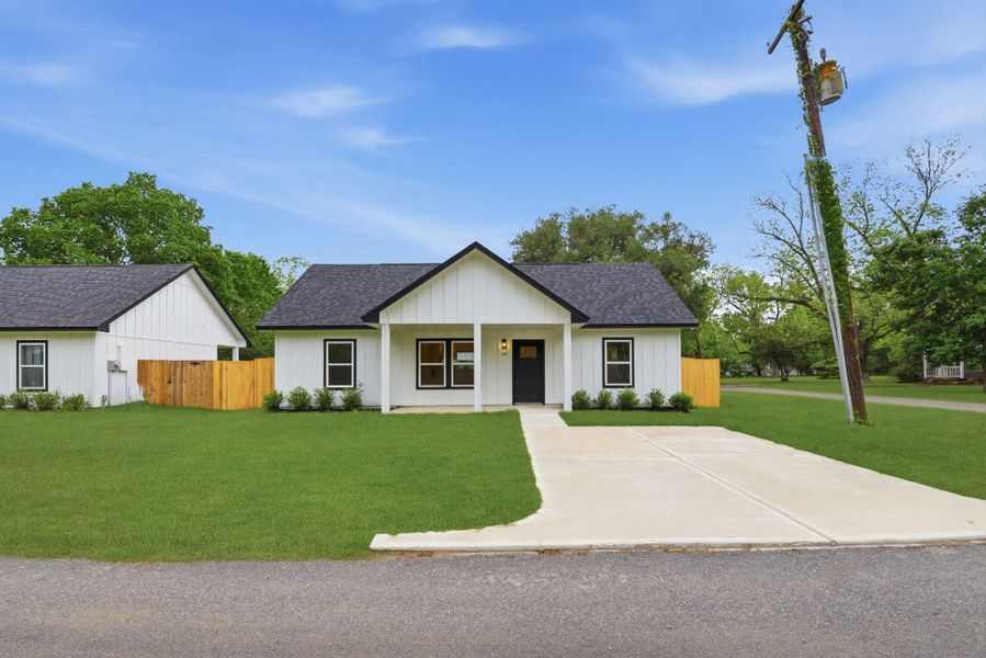 Spacious driveway and front yard