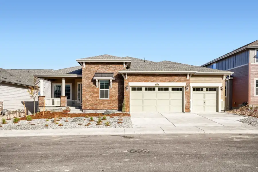 Front exterior of a new home in Macanta, Castle Rock, CO, highlighting curb appeal (Image 1). Front exterior of a new home in Macanta, Castle Rock, CO, highlighting curb appeal (Image 1).
