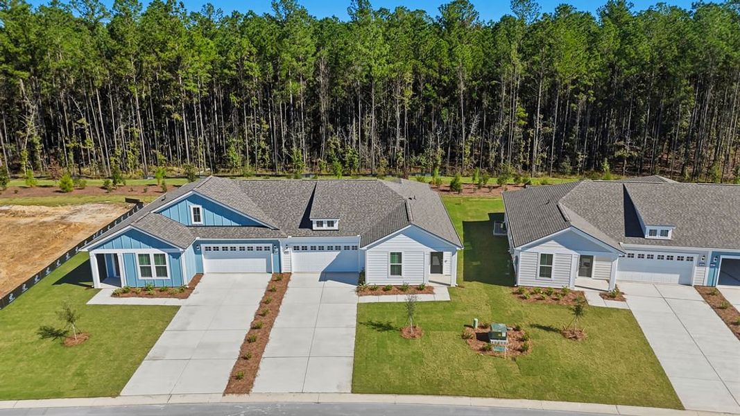Front exterior of a new home in Sun City Hilton Head, Bluffton, SC, highlighting curb appeal (Image 21).