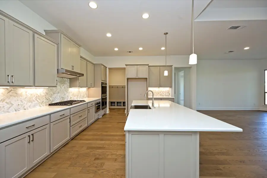 Representative furnished interior of a home built from the Llano II by Giddens Homes in Whispering Wind, Bertram (Image 56). Representative furnished interior of a home built from the Llano II by Giddens Homes in Whispering Wind, Bertram (Image 56).
