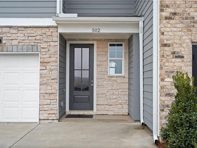 Exterior details and patio area of a home in Stegall Village, Emerson (Image 3).