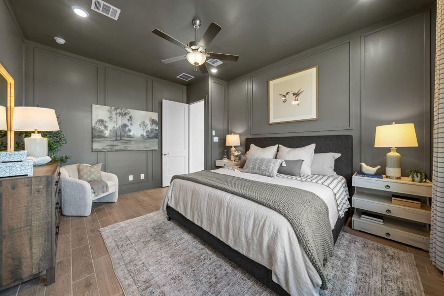 Representative furnished interior of a home built from the Bonneville by Chesmar Homes in University Heights, Round Rock (Image 10).