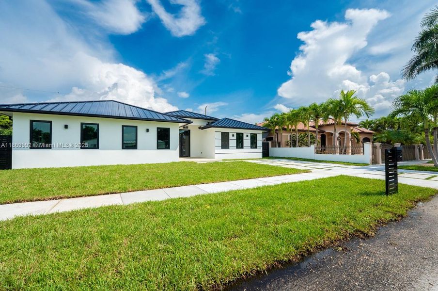 Front exterior of a new home in , Miami, FL, highlighting curb appeal (Image 20).