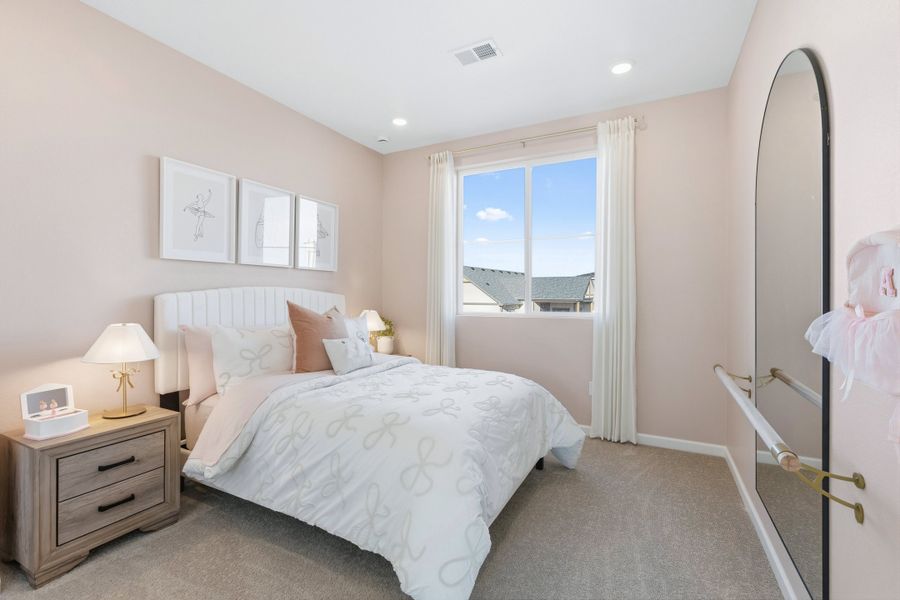 Representative furnished interior of a home built from the 4904 by Risewell Homes in The Aurora Highlands, Aurora (Image 17).