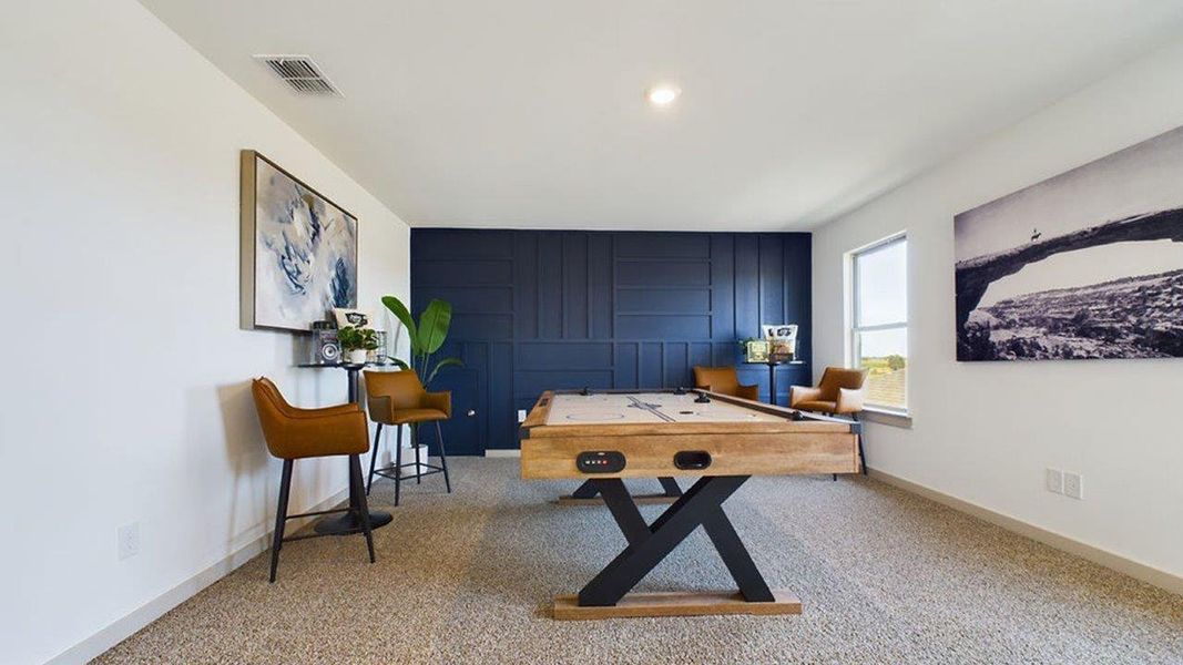Representative furnished interior of a home built from the The Pierce by D.R. Horton in Overlook West, Wolfforth (Image 19).