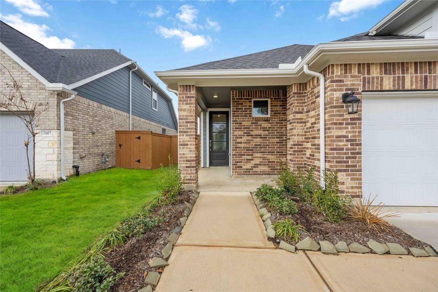Exterior details and patio area of a home in Sunterra, Katy (Image 3). Exterior details and patio area of a home in Sunterra, Katy (Image 3).