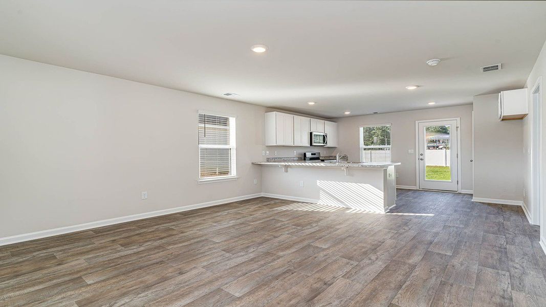 Representative unfurnished interior of a home built from the Curtis by D.R. Horton in Sandpiper Place, Myrtle Beach (Image 10). Representative unfurnished interior of a home built from the Curtis by D.R. Horton in Sandpiper Place, Myrtle Beach (Image 10).