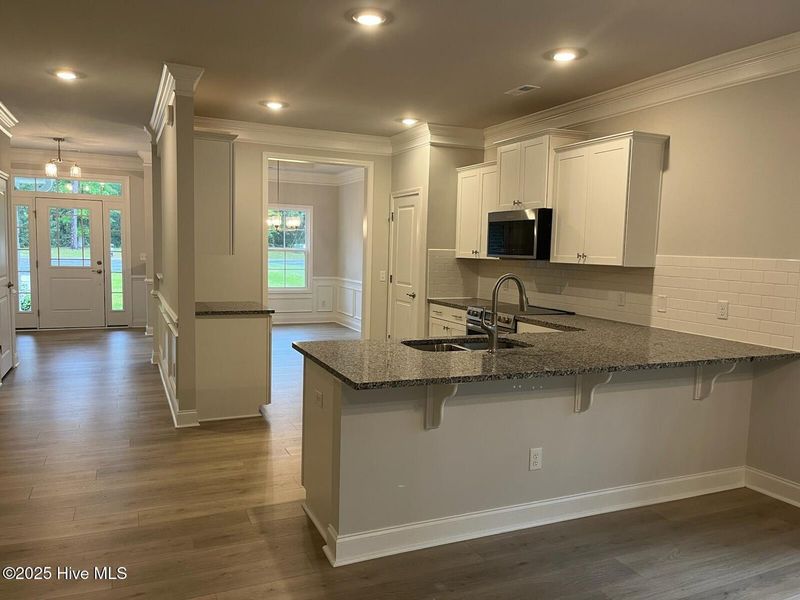 Furnished interior view inside a new home in Palmetto Creek, Bolivia (Image 9).