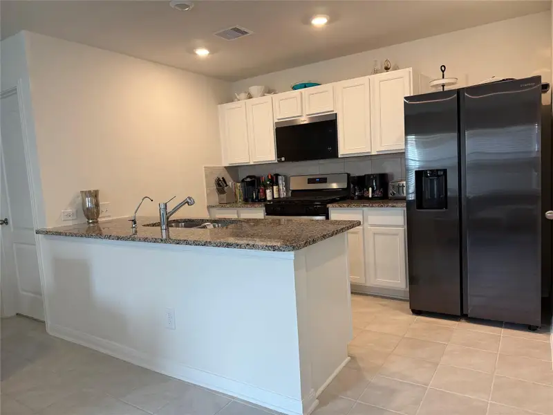 Furnished interior view inside a new home in Sunterra, Katy (Image 8). Furnished interior view inside a new home in Sunterra, Katy (Image 8).