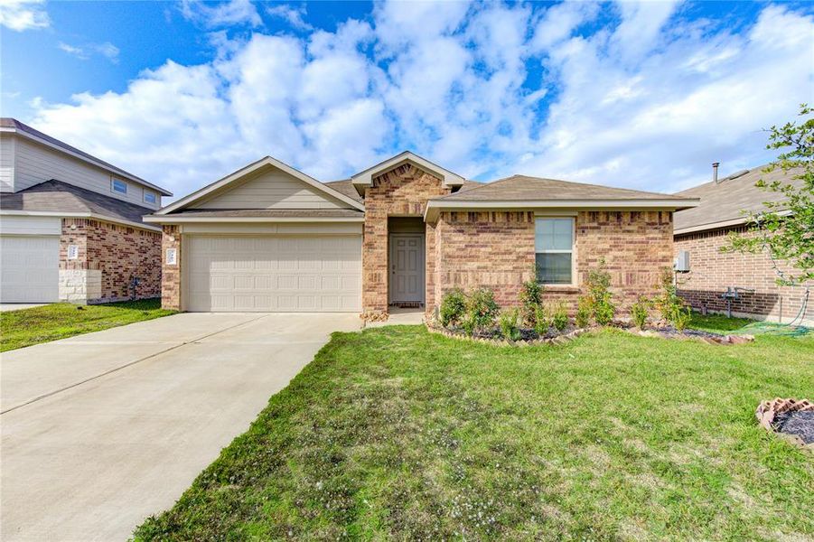 Cozy one story home with brick