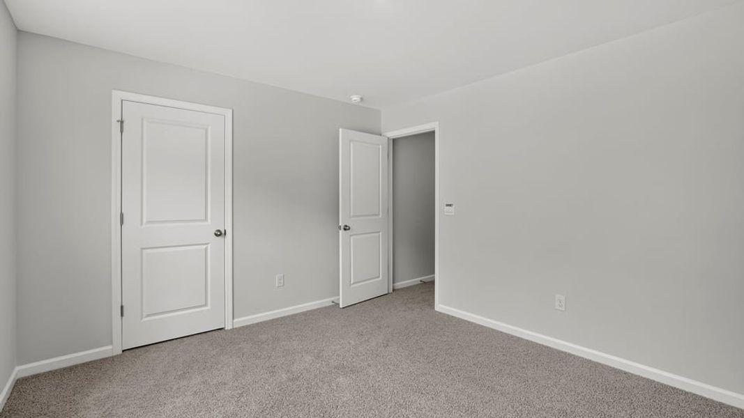 Spacious, unfurnished interior of a new home in Bentley Park, Greenwood (Image 26). Spacious, unfurnished interior of a new home in Bentley Park, Greenwood (Image 26).