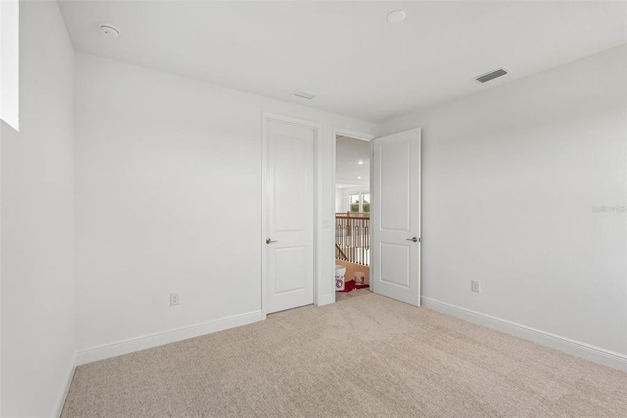 Spacious, unfurnished interior of a new home in Hawkstone, Sarasota (Image 22).
