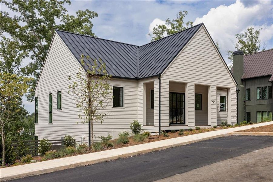 Front exterior of a new home in , Chattahoochee Hills, GA, highlighting curb appeal (Image 2).