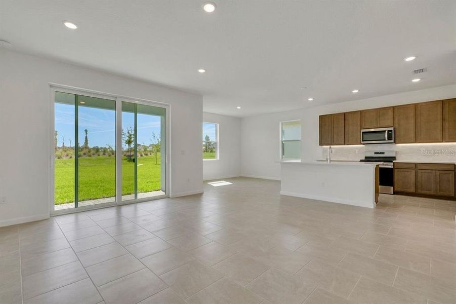 Spacious, unfurnished interior of a new home in Brystol North at Wylder, Port St. Lucie (Image 22).