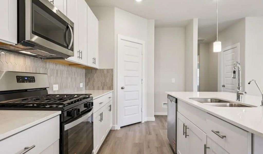 Photo is not of the actual home, but is an inspirational photo of builder’s model home and may depict options, furnishings, and/or decorator features that are not included Photo is not of the actual home, but is an inspirational photo of builder’s model home and may depict options, furnishings, and/or decorator features that are not included